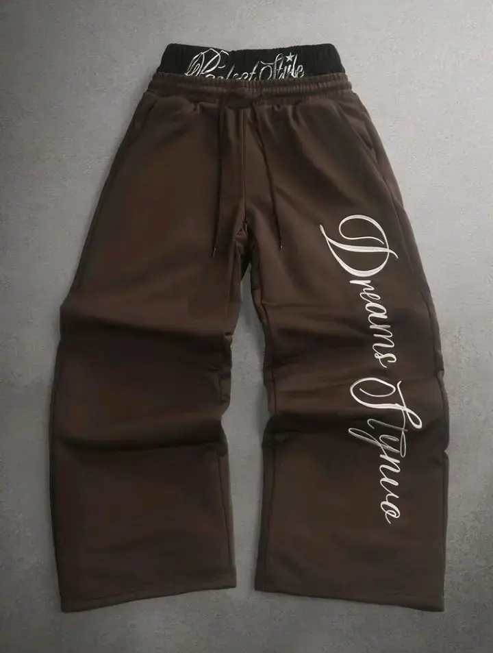 Pantalones baggy marrones con diseño de letras - 1