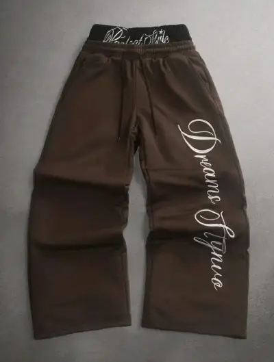 Pantalones baggy marrones con diseño de letras - miniatura 1