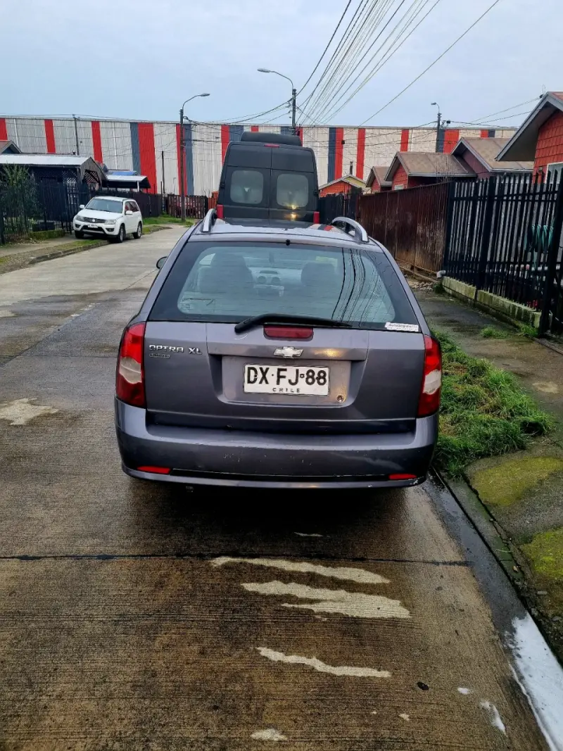 Auto familiar station wagon gris en buen estado - 4