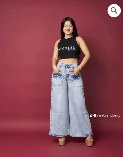 Jeans anchos de mezclilla azul claro con detalles desgastados - miniatura 3