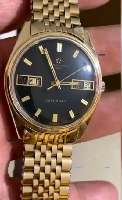 Reloj automático dorado con calendario - miniatura 1
