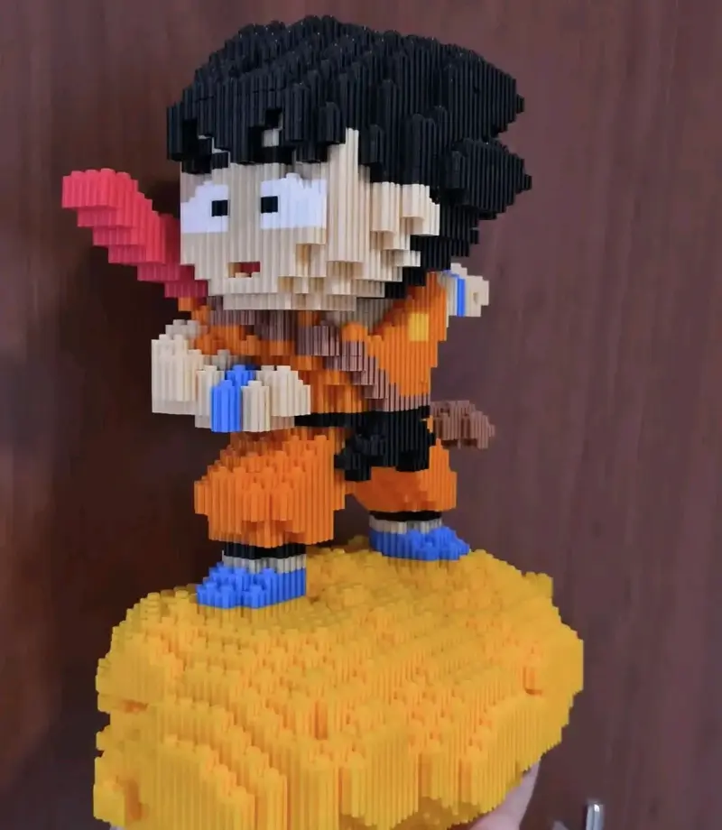 Figura de bloques Goku en nube voladora