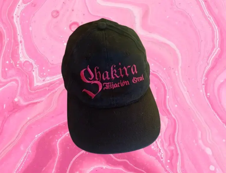Gorra negra Shakira Atracción Oral