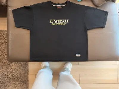 Polera Evisu Negra y Hollister Cobra - miniatura 1