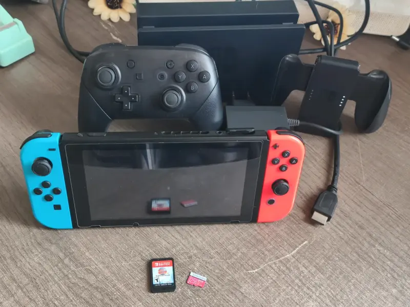 Consola Nintendo Switch con accesorios y juegos - 1