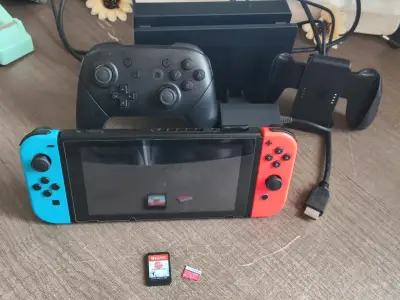 Consola Nintendo Switch con accesorios y juegos - miniatura 1