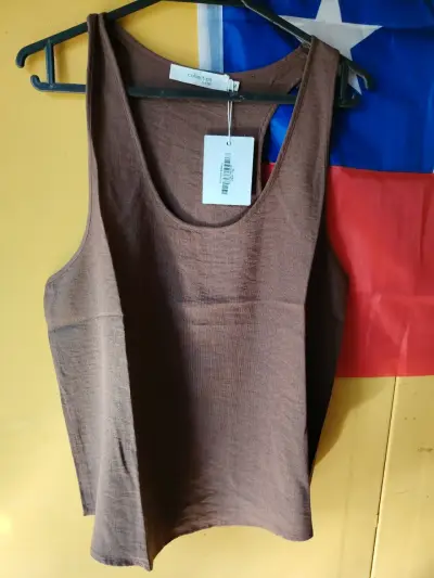 Polera sin mangas marrón y negra para mujer - miniatura 1