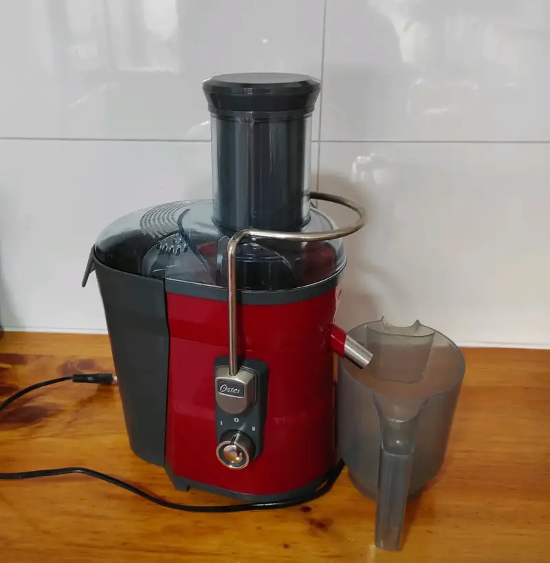 Extractor de Jugos Oster Rojo 600W - 2