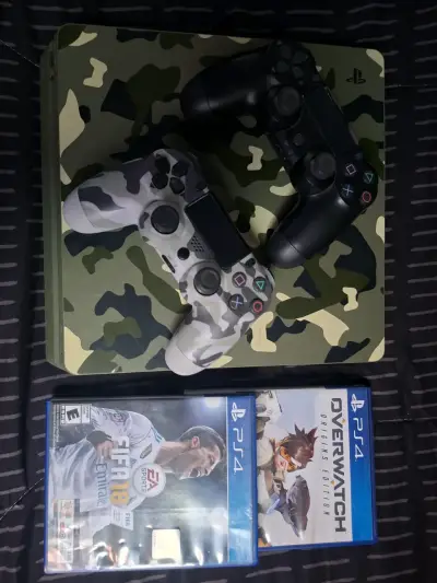 Consola PS4 Slim Camuflaje con 2 Controles y 2Jueg - miniatura 1
