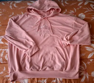 Polerón rosado con capucha - miniatura 1