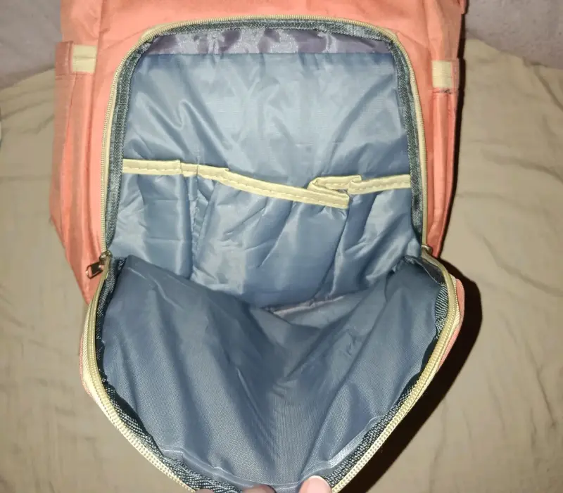 Mochila multifuncional para bebé color salmón - 2