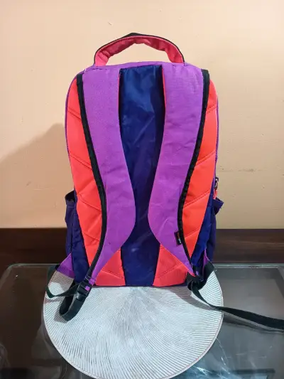 Mochila Under Armour morada con detalles naranjas - miniatura 3