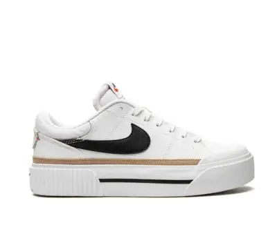 Zapatillas deportivas blancas Nike con diseño moderno - miniatura 2
