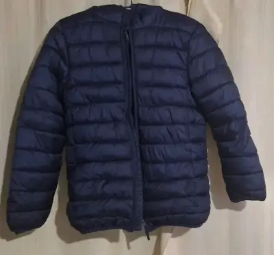Chaqueta acolchada azul para niña - miniatura 1