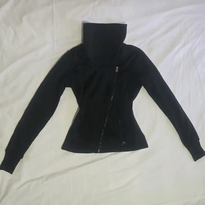 Chaqueta deportiva Head asimétrica