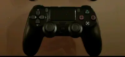 Control inalámbrico para PlayStation 4 negro - miniatura 1