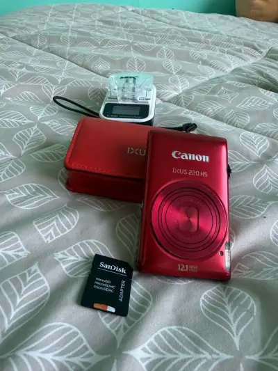 Cámara digital Canon IXUS 220 HS roja con accesori - miniatura 1