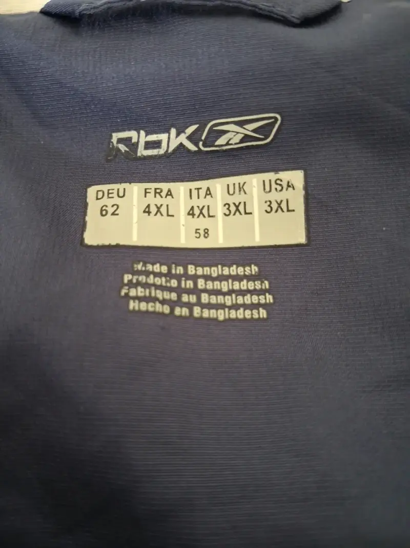 Cortaviento Reebok azul con detalles blancos - 4