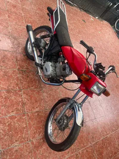 Moto roja usada en buen estado funcionando $350000 - miniatura 2