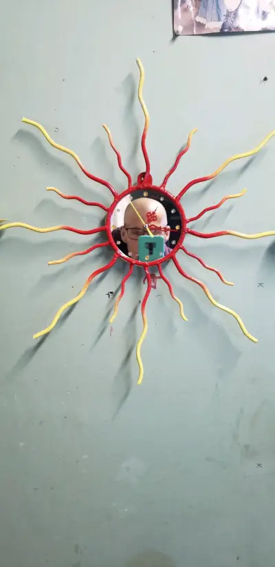 Reloj de Pared Decorativo Sol de Metal - miniatura 1