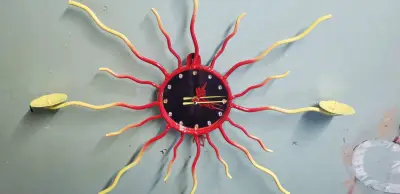 Reloj de Pared Decorativo Sol de Metal - miniatura 2