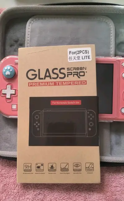 Consola Nintendo Switch Lite Coral con Estuche - miniatura 3