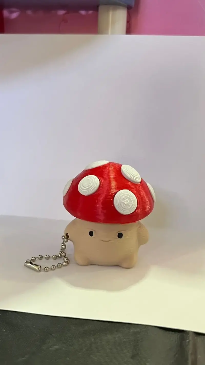 Llavero de hongo clicker antiestrés