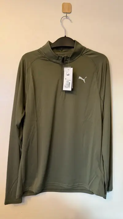 Polera deportiva verde oliva Puma para hombre - miniatura 1