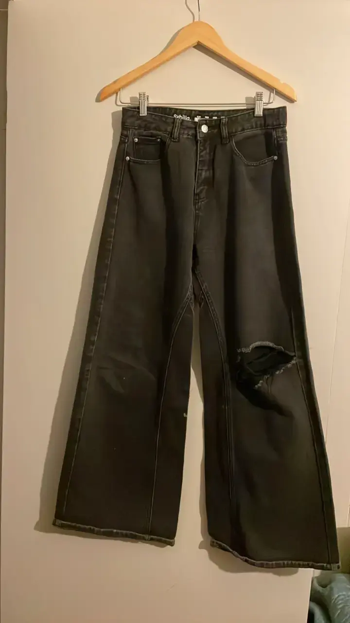 Jeans negros anchos con rotura Sybilla - 1