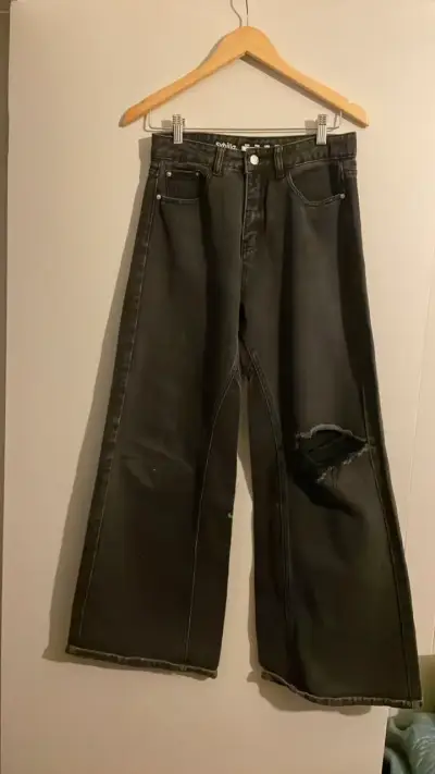 Jeans negros anchos con rotura Sybilla - miniatura 1