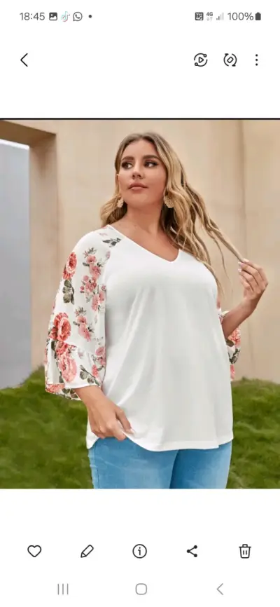 Blusa de mujer con mangas florales - miniatura 1
