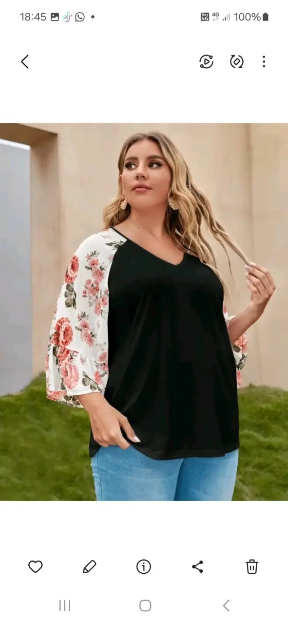 Blusa de mujer con mangas florales - 2