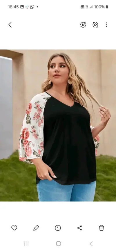 Blusa de mujer con mangas florales - miniatura 2