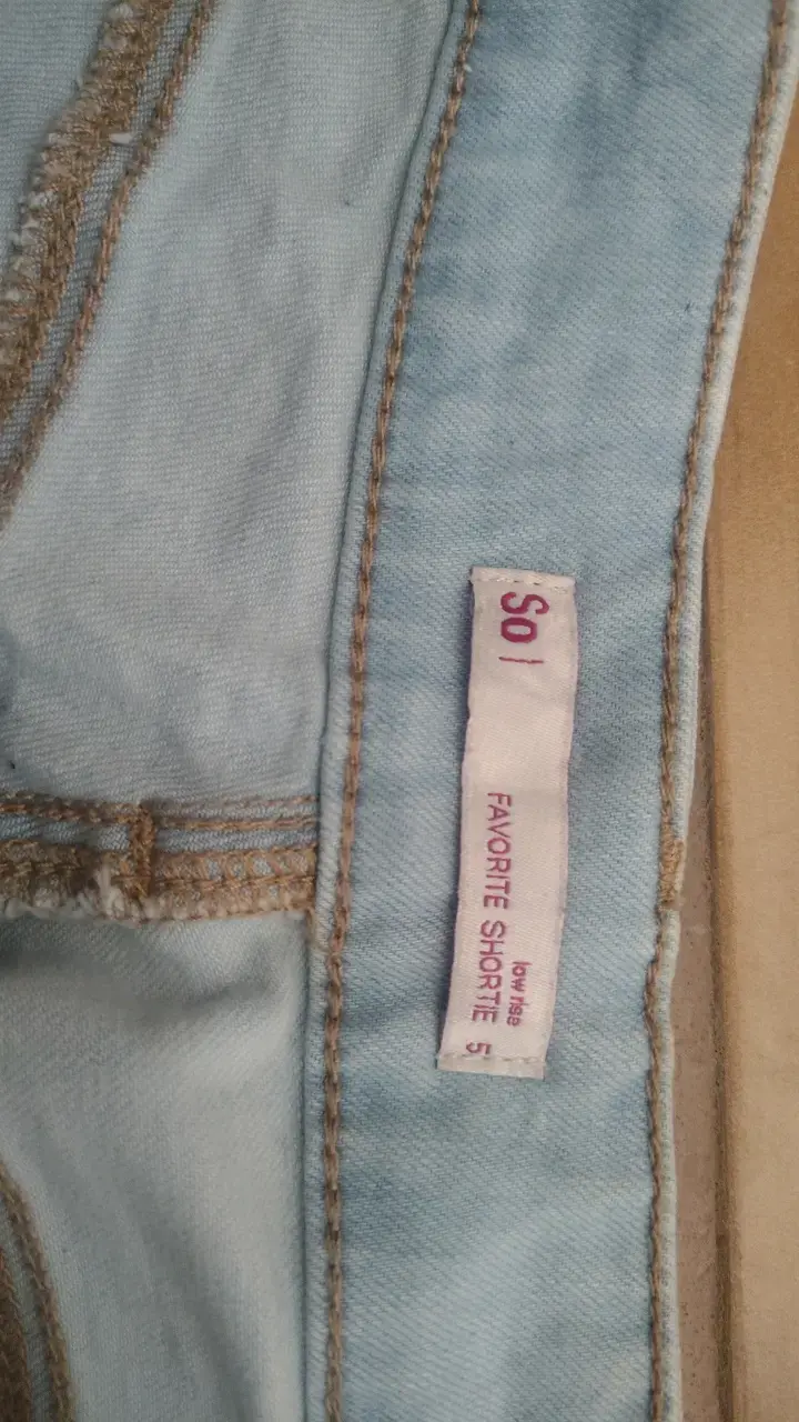 Shorts de mezclilla desgastados para mujer - 3