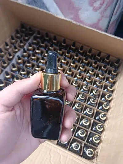 50 frascos en 60.000, son de vidrio - miniatura 1