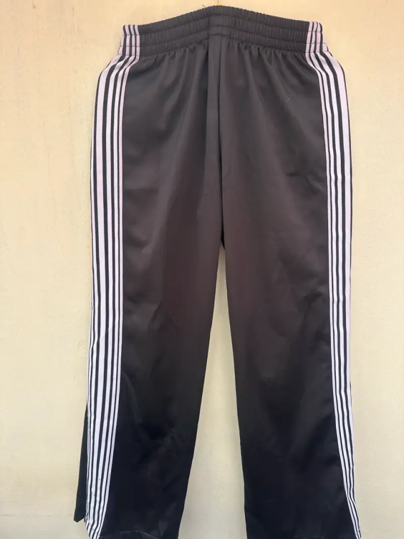 Pantalones deportivos negros con franjas blancas talla XS - 1