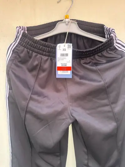 Pantalones deportivos negros con franjas blancas talla XS - miniatura 2
