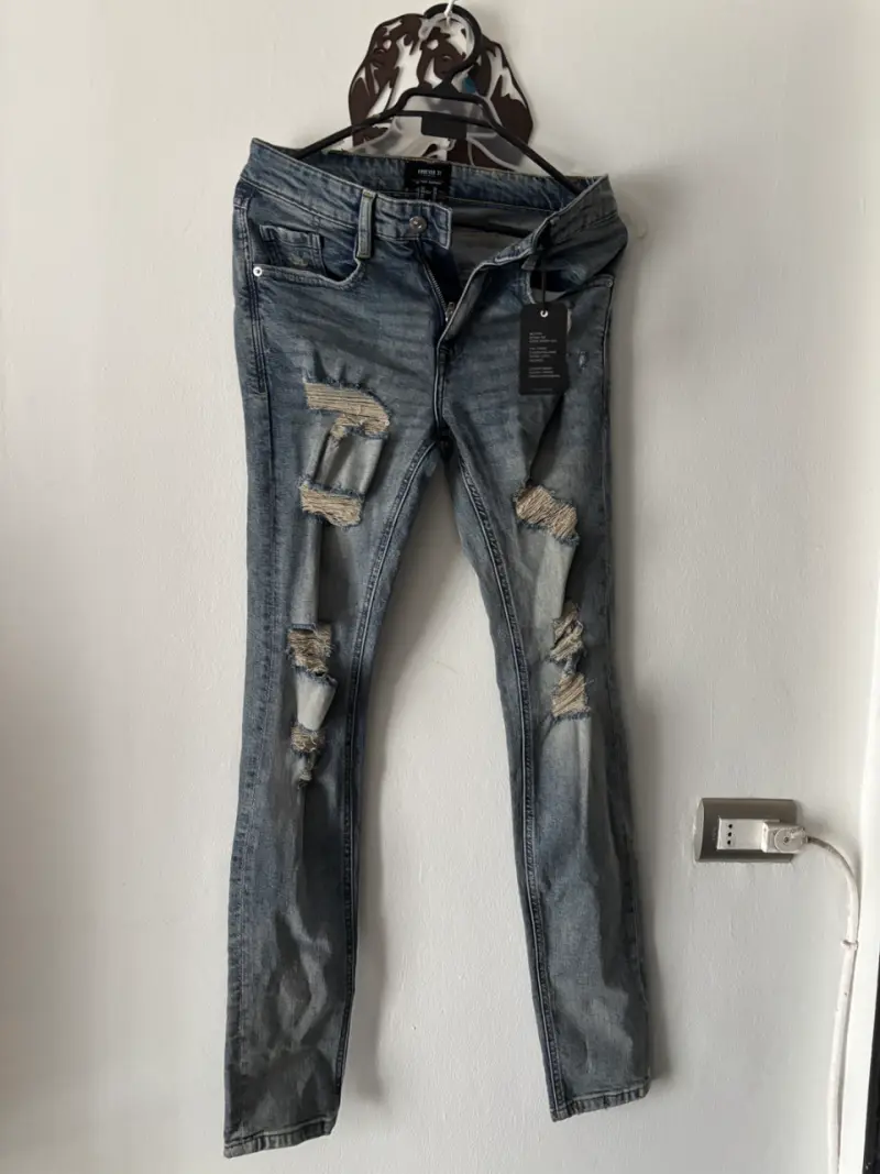 Jeans rasgados azul claro para mujer