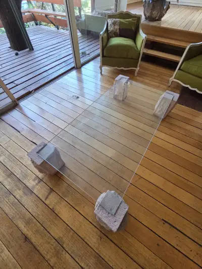 Mesa de centro de vidrio con base de piedras de Pe - miniatura 1