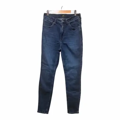 Jeans ajustados azul oscuro para mujer - miniatura 1