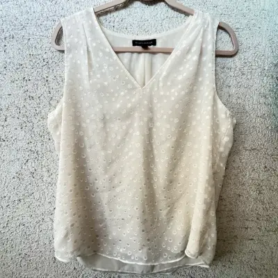 Blusa sin mangas blanca con textura - miniatura 1