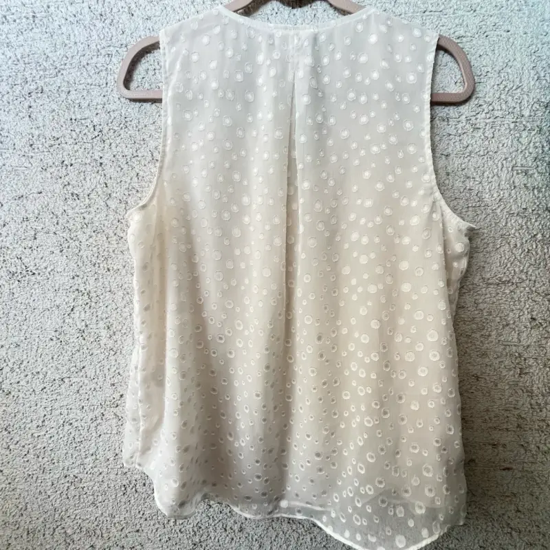 Blusa sin mangas blanca con textura - 3