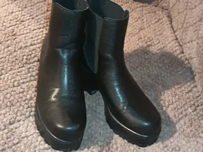 Botines negros de cuero para mujer - miniatura 1