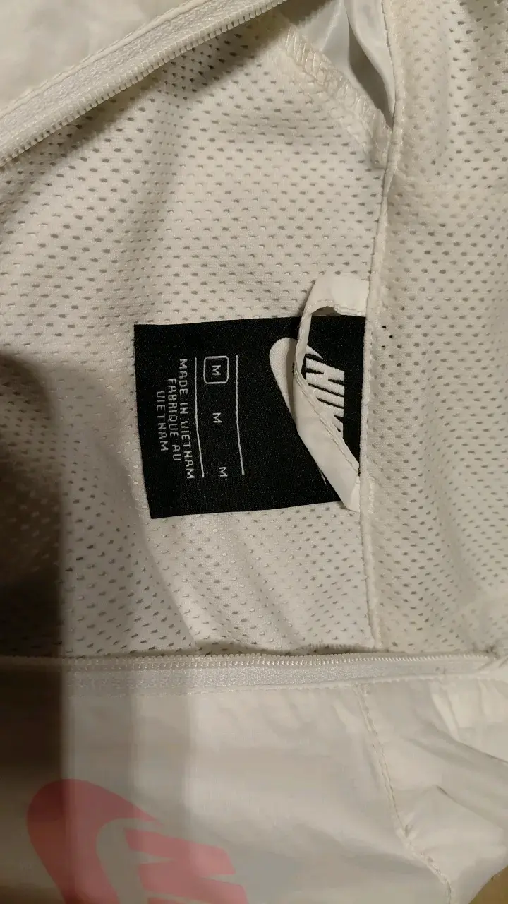 Chaqueta cortaviento Nike rosa y blanca - 2