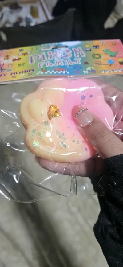 Juguete antiestrés en forma de patita con brillo - miniatura 2