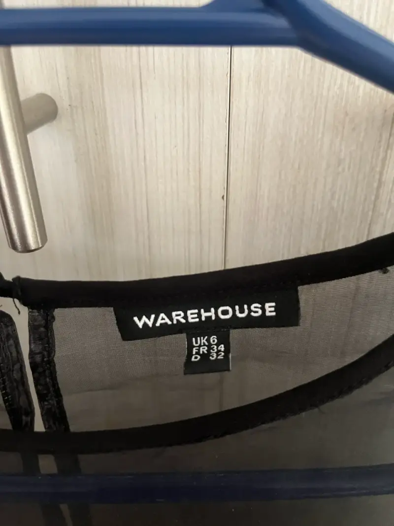 Blusa floral sin mangas Warehouse - 2