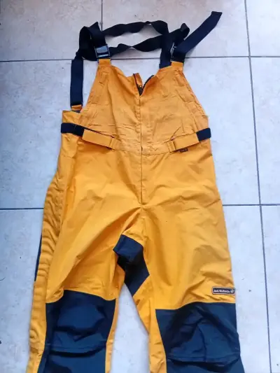 Pantalones impermeables Jack Wolfskin amarillos - miniatura 1
