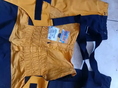 Pantalones impermeables Jack Wolfskin amarillos - miniatura 5