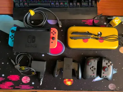 Consola Nintendo Switch con accesorios y juego Metroid Dread - miniatura 1