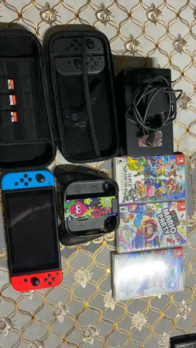 Nintendo Switch con juegos y accesorios - miniatura 1